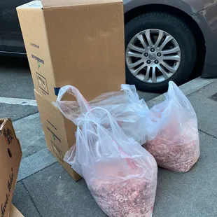 In front of the store they leave out big bags of ground meat in bags, on the street.