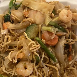 Garlic shrimp over noodles