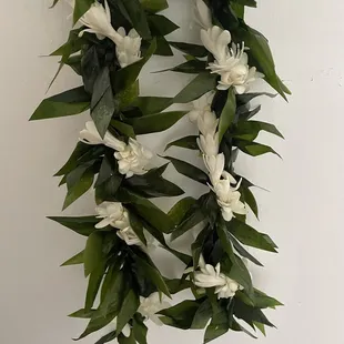 Perfect Ti leaf lei and haku lei for weddings