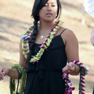 Lei bearer with leis for Parent's Lei Ceremony