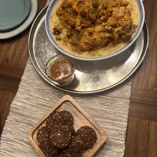 Falafel from dried chickpeas, couscous with t&apos;afay and preserved lemon chicken Tajin that I served together.