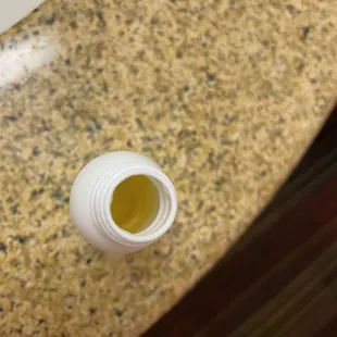 Opened and 1/2 used shampoo bottle (I did not open this!)