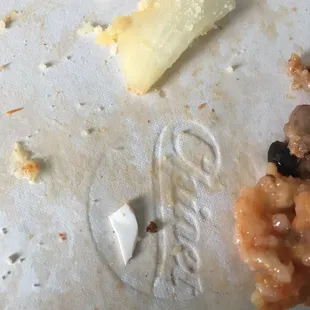 A sharp piece of plastic found in a vegetarian pizza we had delivered. Ugh!