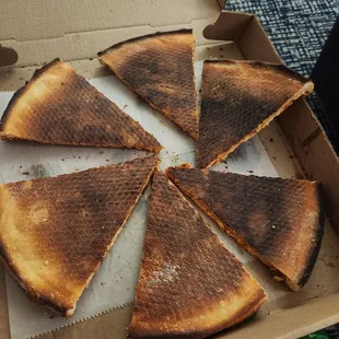 a burnt pizza
