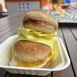 English muffin with jam and Sausage cheese and egg sandwich
