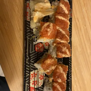 a close up of a plate of sushi