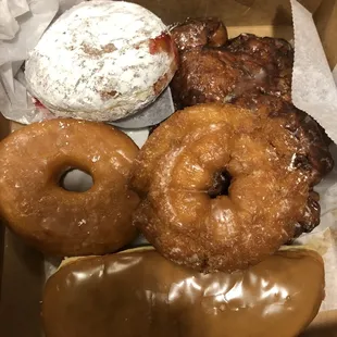 a variety of donuts in a box