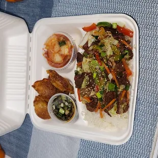 a take out container of food