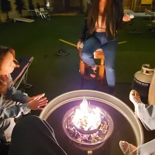 Guests around the fire pit