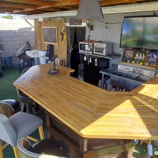 Full kitchen and wash sink. 2 coolers and a fridge