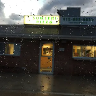raindrops on the window of a restaurant