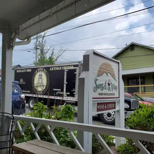 a view of a truck parked in front of a restaurant