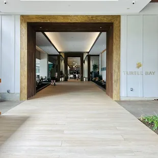 Walk through the hotel to get to the bar.