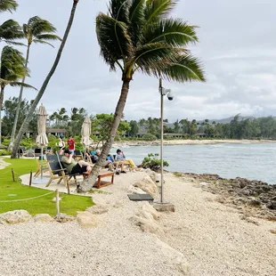 Lounge chairs overlooking the water.