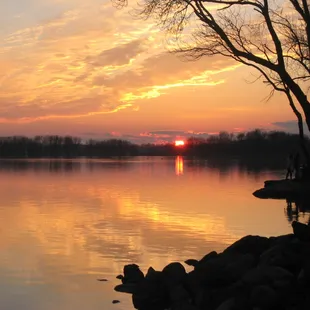 a view of a lake at sunset