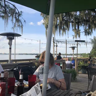 Eating exquisite food with an amazing Lake view on their patio!!