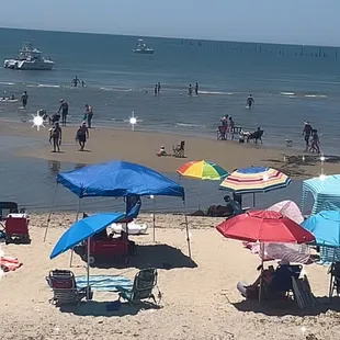 "Pull your boat up to the sandbar and come on in!"