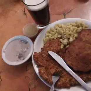 German night schnitzel, spaetzle,potato pancakes, applesauce, mushroom wine sauce and Amber Bock:the best!