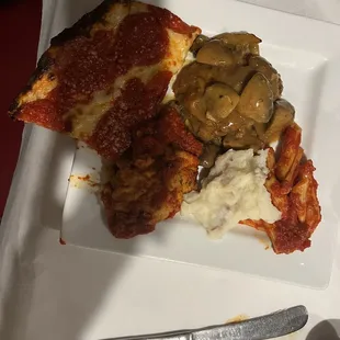 Buffet of Chicken Marsala, pizza, mashed potatoes, eggplant...