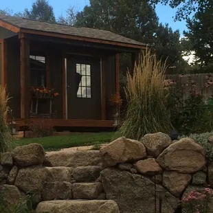 10x12 Superior 7 King Ranch with custom porch and cedar trim