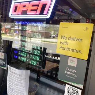 a neon sign in the window