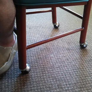 Wobbly rolling chairs and uneven tables.