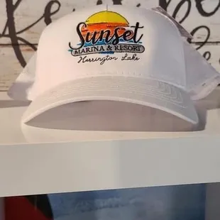 a white hat on a shelf