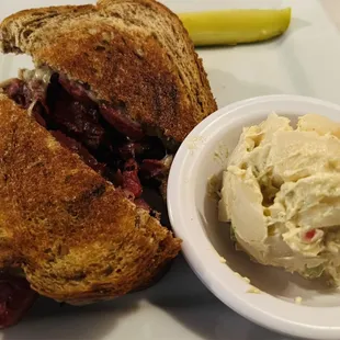 Sunset Sailor Sandwich (pastrami, knockwurst, &amp; Swiss cheese) with Potato Salad ($12.95).