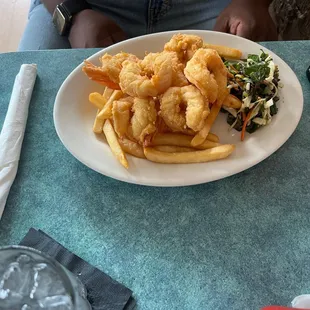Shrimp, fries, and cole slaw