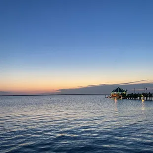 a view of a restaurant on the water