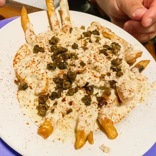 Pictured: Crab bisque topped with crabmeat, fried capers and Old Bay