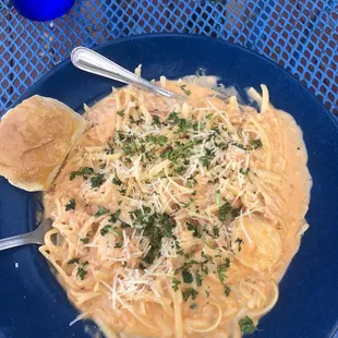 Shrimp scallops and lobster in a vodka like sauce