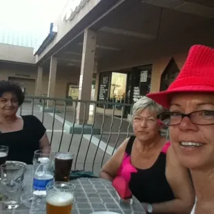 a group of women sitting at a table