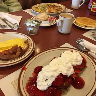 Amazing breakfast menu !!! cinnamon roll with fresh strawberries and whipped cream! The food was served hot and fresh!!