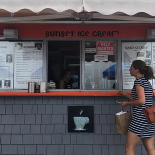 a woman in a striped dress