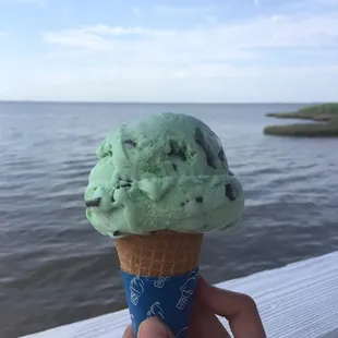 hand holding ice cream cone