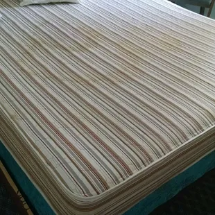 Sorry we forgot to take pictures of the dirty sheets. This bed looks like it hasn't been replaced since the 80s.