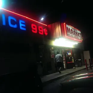 a neon sign for ice bbq