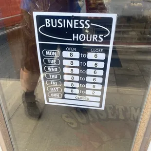 Store hours on the door