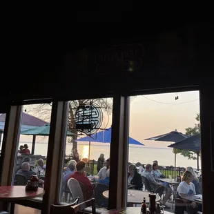 people sitting outside a restaurant
