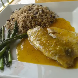 Tilapia with coconut rice and asparagus side