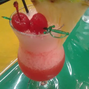 Zombie: pineapple juice, lime, sunset rum, sugar, apricot brandy, light rum, 151 rum, passion fruit syrup
