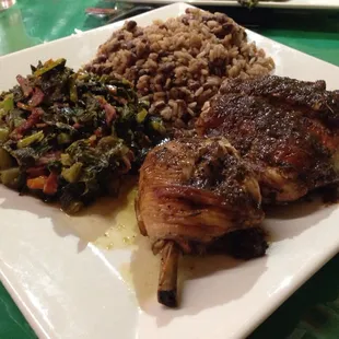 Jerk chicken, collards and coconut rice with peas