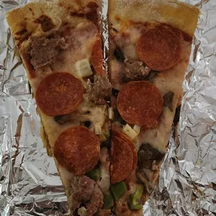 Sunset Pizza Slices were so ono da kine! Thin, warm and delicious!