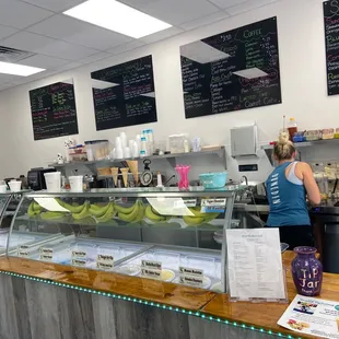 a woman standing at the counter