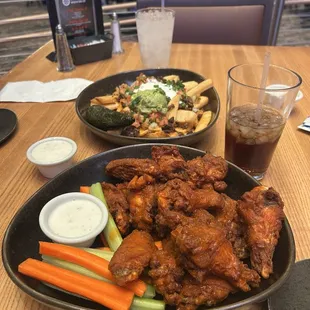 Carne asada fries and buffalo wings