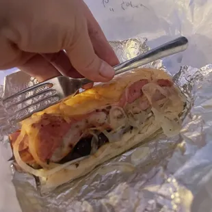 Not even as big as a fork. It was slightly shy of 5 inches. Maybe the man making it is over compensating?