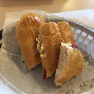 Here at Sunset Subs with my friend Johnny and we're having these delicious Cuban sandwiches.