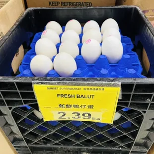 a crate of fresh balut eggs