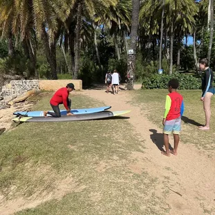 Getting some lessons on land before heading to the ocean